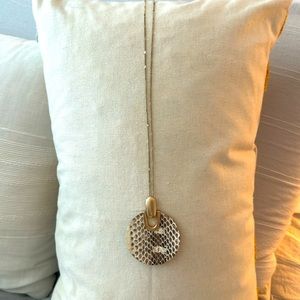 Necklace is in good condition and is 18” in length